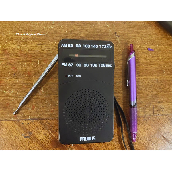 PRUNUS Portable Radio AM FM, Battery Operated Radio with Tuning Light, Back Clip