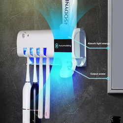 ប្រដាប់ដាក់ច្រាស និងថ្នាំដុសធ្មេញ UV