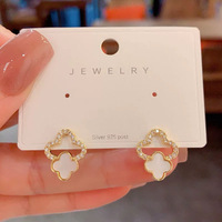 E75 Woman's Earrings /ក្រវិលផ្កាស