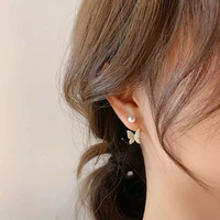 E144 Woman's Earrings /ក្រវិលមេអំបៅ